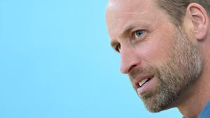 Britains Prince William, Prince of Wales reacts during a visit as The Royal Foundation launches a new community impact partnership with Street Soccer Scotland at Leith Community Centre, in Leith, Scotland, on May 21, 2025. (Photo by Chris Jackson / POOL / AFP)