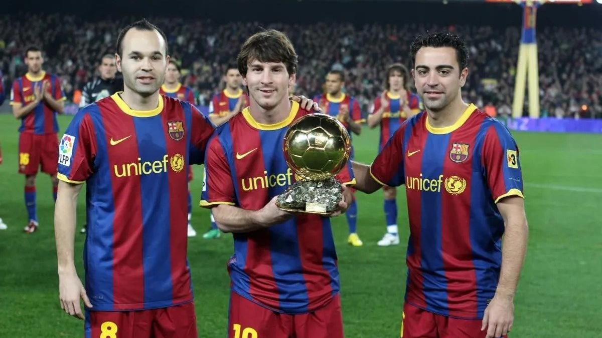 Messi, Iniesta y Xavi con el balón de oro