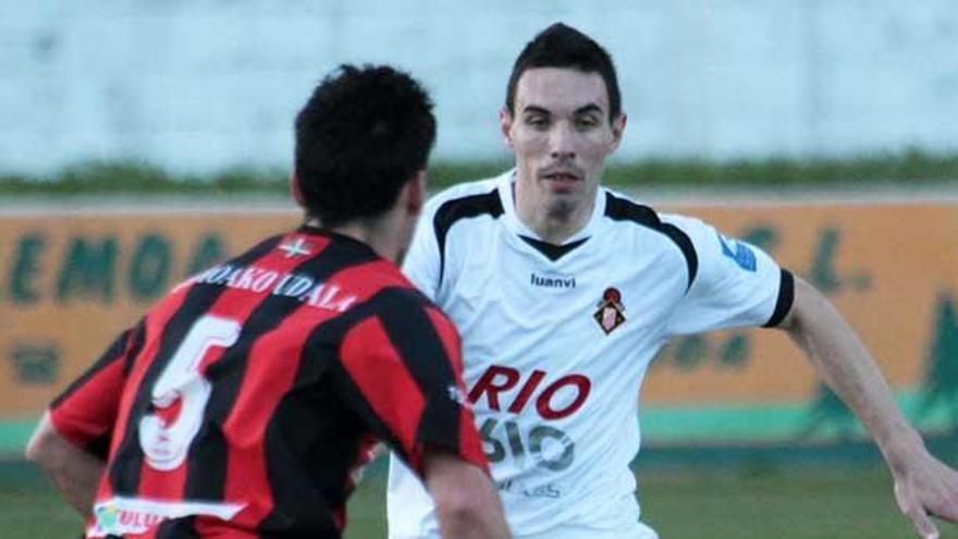 Javi Camochu, a la izquierda, y Berto Toyos, ambos vistiendo la camiseta del Caudal.