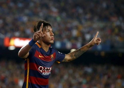 Barcelona's Neymar celebrates a goal against AS Roma during a friendly match at Camp Nou stadium in Barcelona
