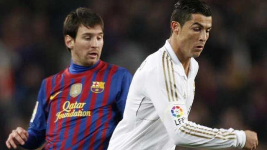 Messi y Ronaldo, durante un partido.