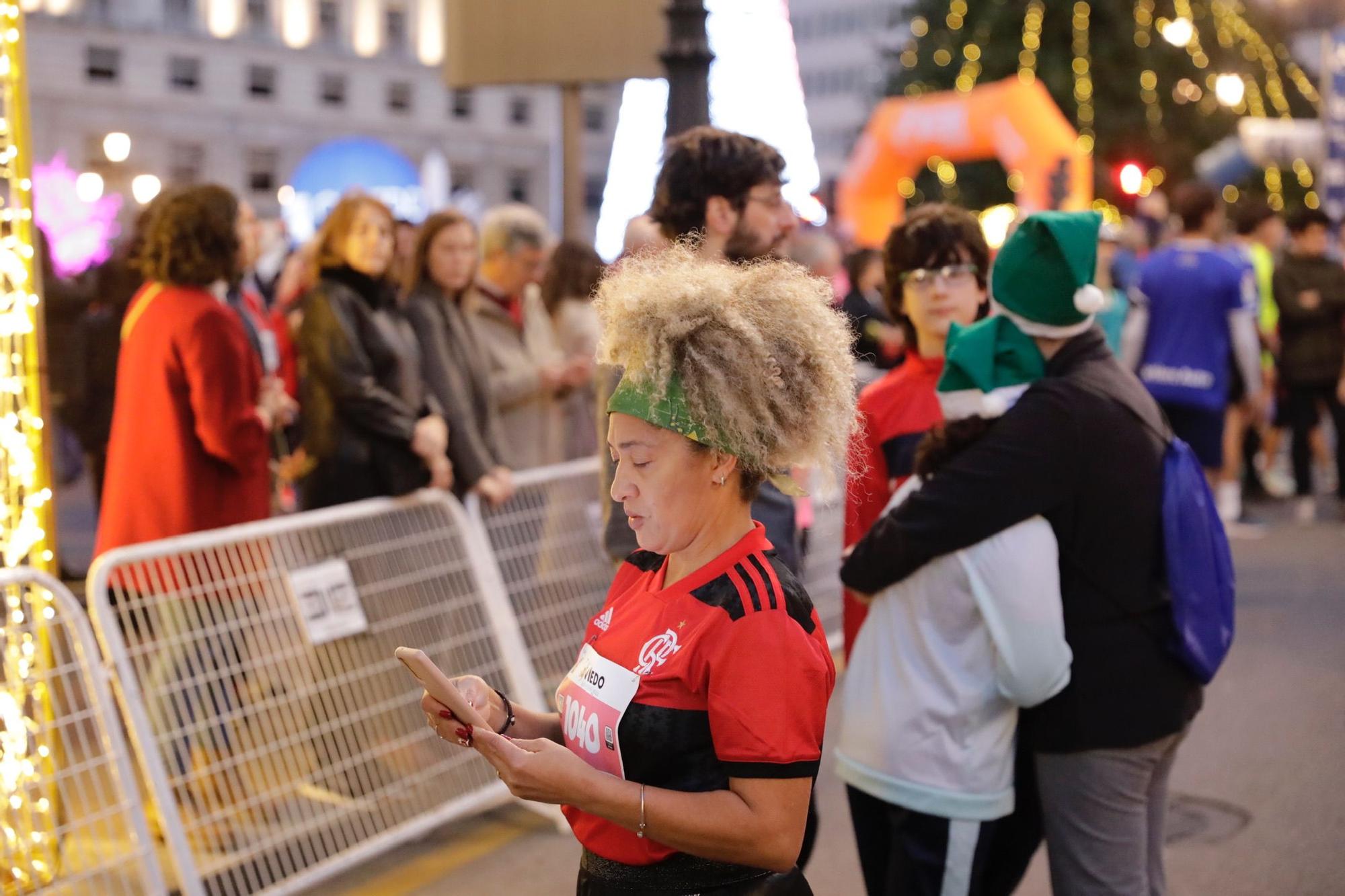 En imágenes: Jaime Bueno (Univerisad de Oviedo) y Mariam Benkert triunfan en la San Silvestre de Oviedo