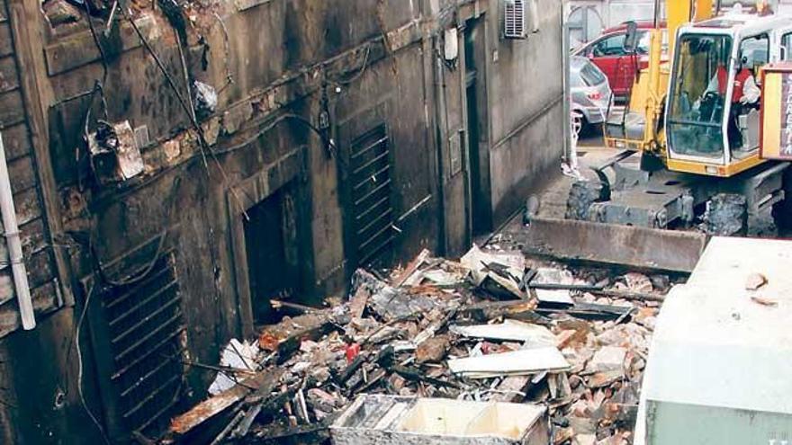 Derrumbe en un edificio de la calle de Los Moros.