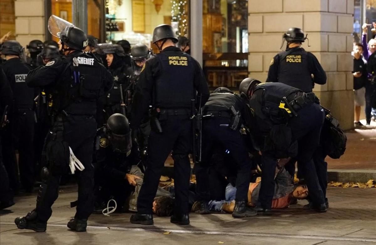 jgblanco36242651 police detain a demonstrator during a protest against the el161111120606