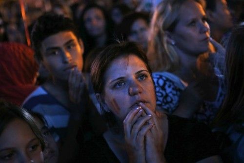 Supporters of Madrid react after the announcement that Madrid has been eliminated from IOC's voting process to select the host city for the 2020 summer Olympic Games, at Madrid