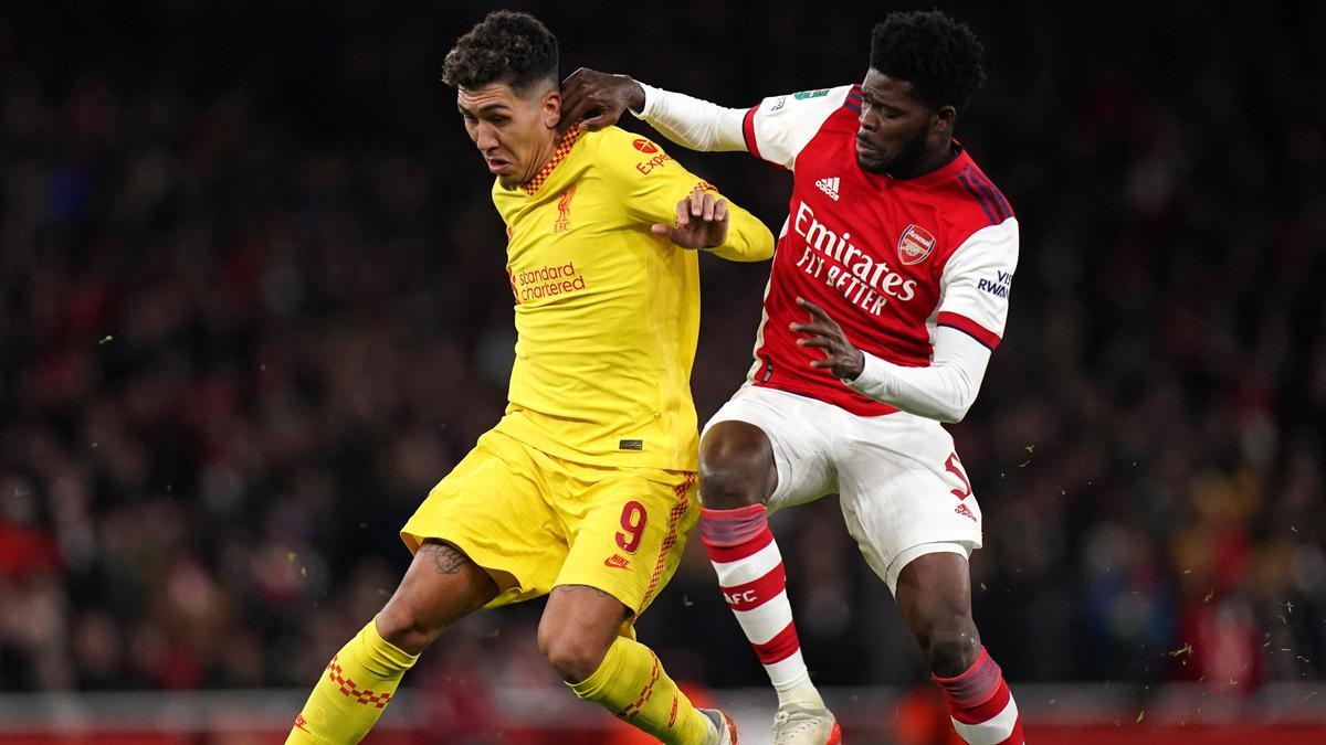 Roberto Firmino y Thomas Partey