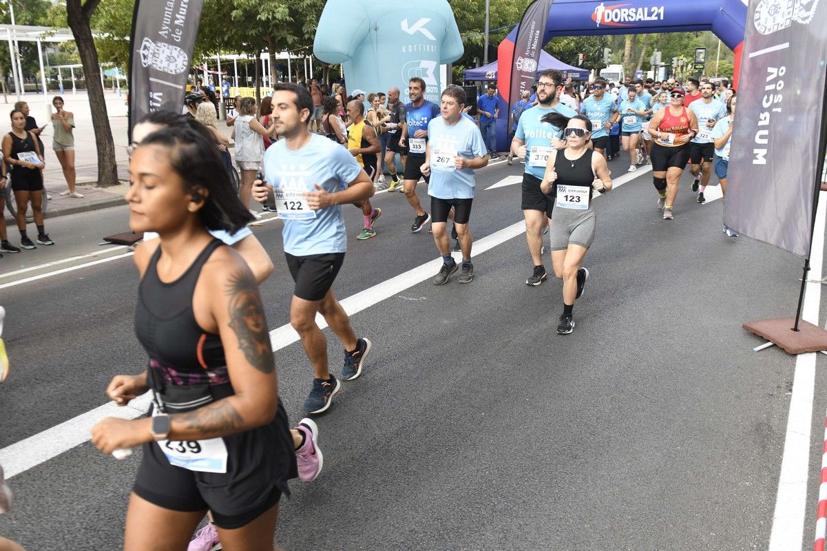 La carrera y marcha Solidaria Asteamur, en imágenes