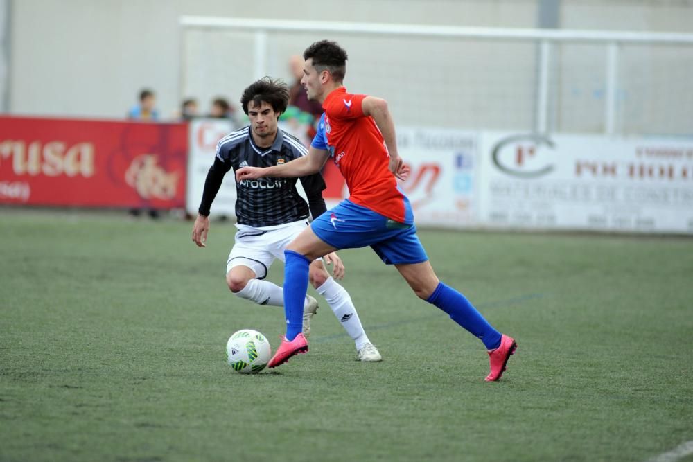 El partido entre el Langreo y el Oviedo B, en imágenes