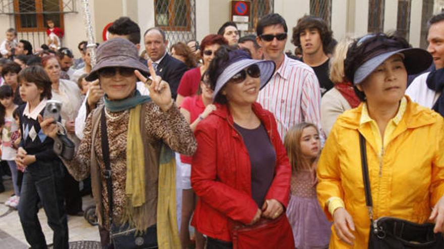 Turistas el Domingo de Ramos pasado, en la calle Larios.