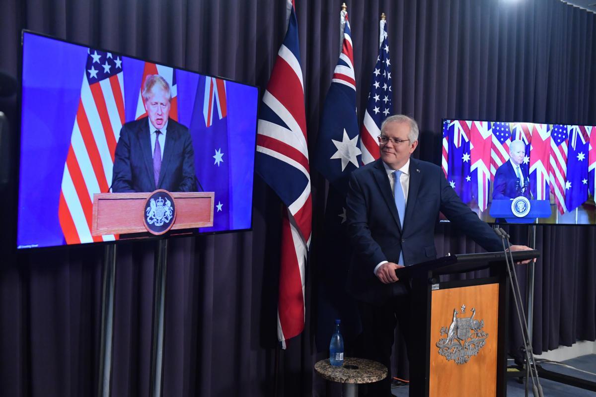 El primer ministro británico, Boris Johnson, su homólogo australiano, Scott Morrison, y el presidente de Estados Unidos, Joe Biden, emn una rueda de prensa conjunta tras anunciar la creación de la alianza AUKUS.