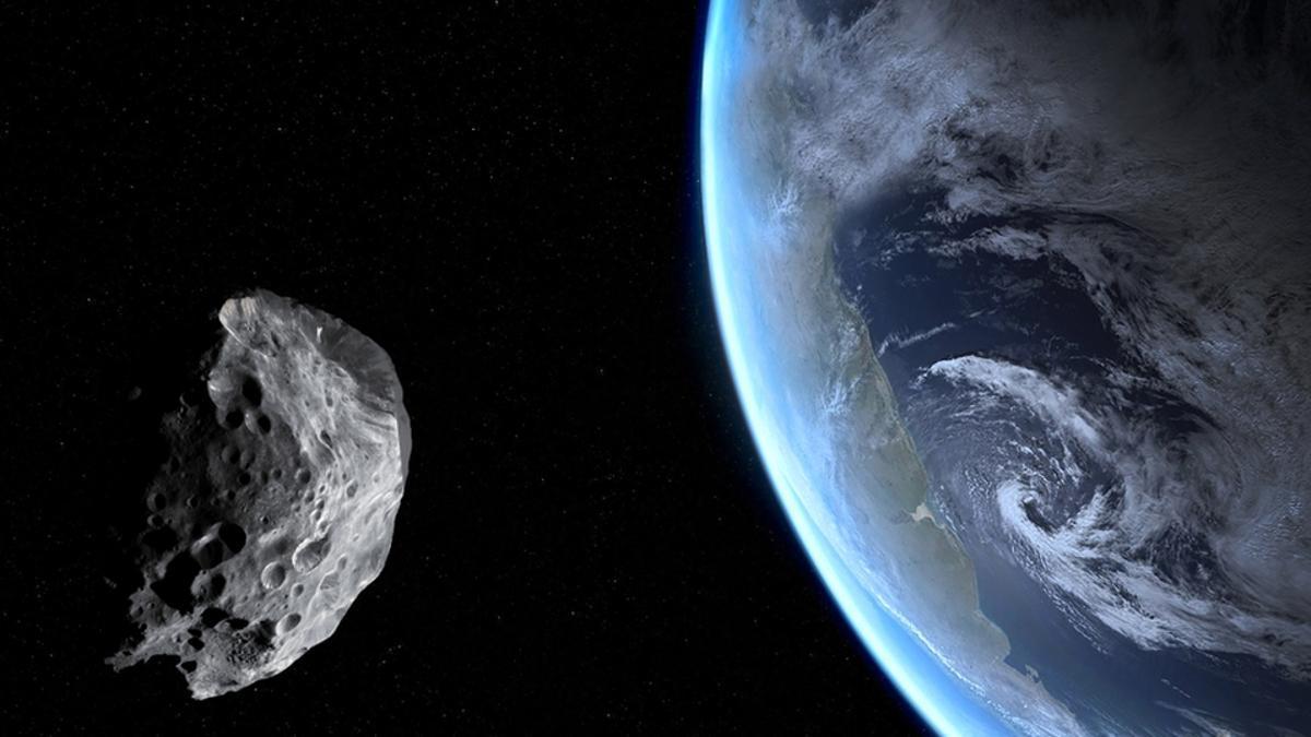 Simulación de un asteroide orbitando alrededor de la Tierra.