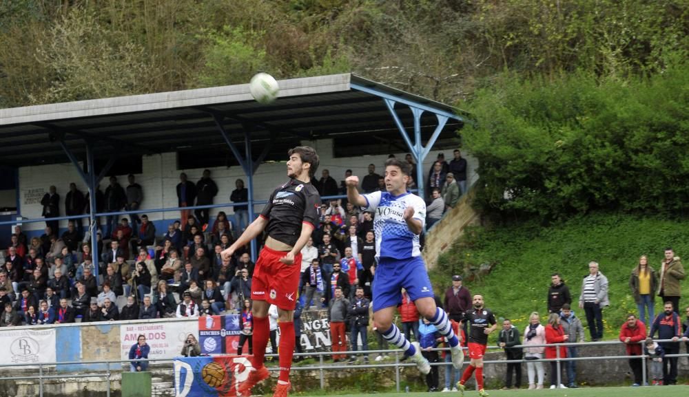 El partido entre el Tuilla y el Langreo, en imágenes