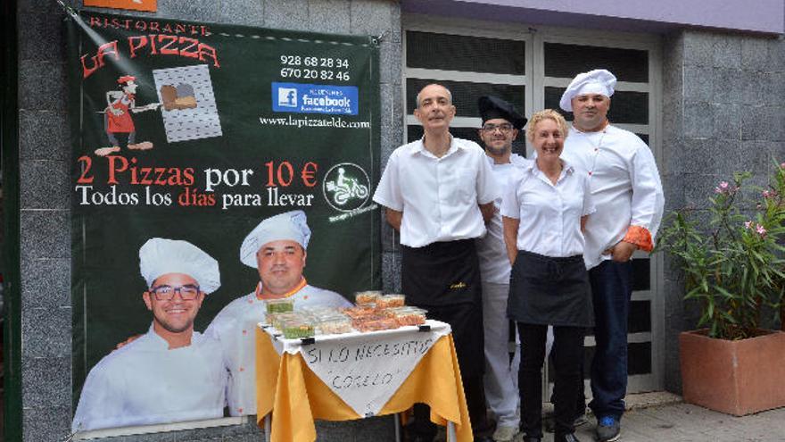 Una pizzería de Telde reparte tarrinas gratis con comida para los necesitados