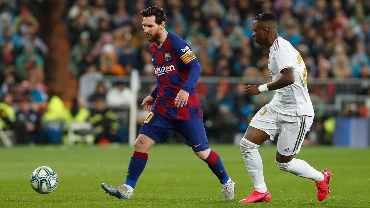 Messi y Vinicius, en un partido de la temporada 2019/2020