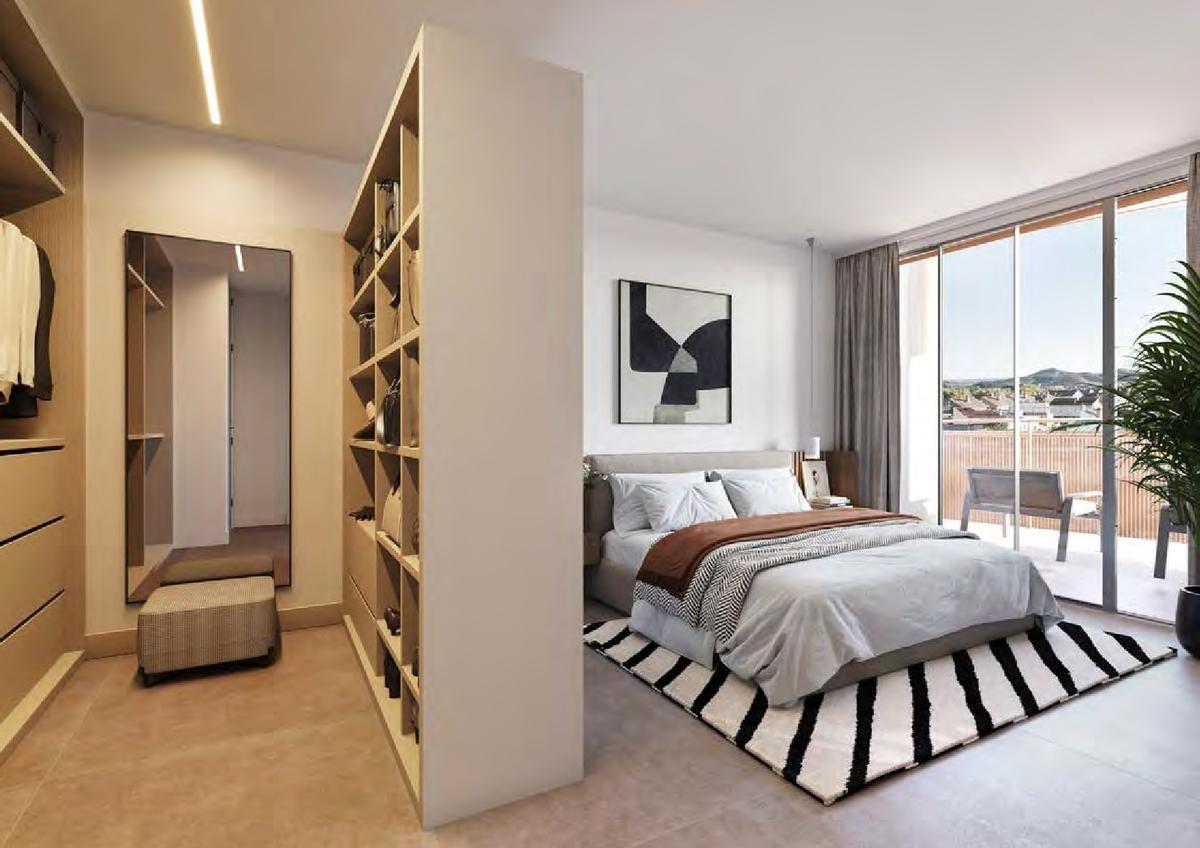 El dormitorio principal cuenta con vestidor, baño en suite y una amplia zona para descansar.