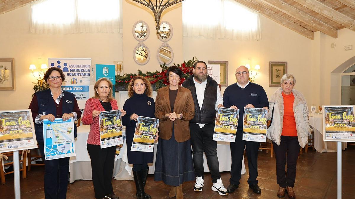 Presentación de la iniciativa para los mayores 'Taxi Luz'.