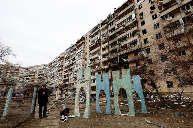 A residential building is damaged, after Russia launched a massive military operation against Ukraine, in Kyiv