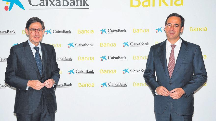 La integración de CaixaBank y Bankia para alumbrar el gran banco costará 3.400 millones