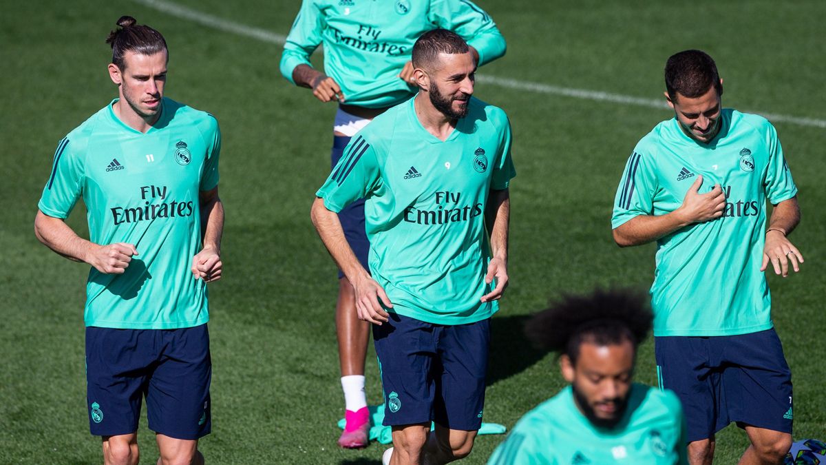 Bale y Hazard escoltan a Benzema en un entrenamiento
