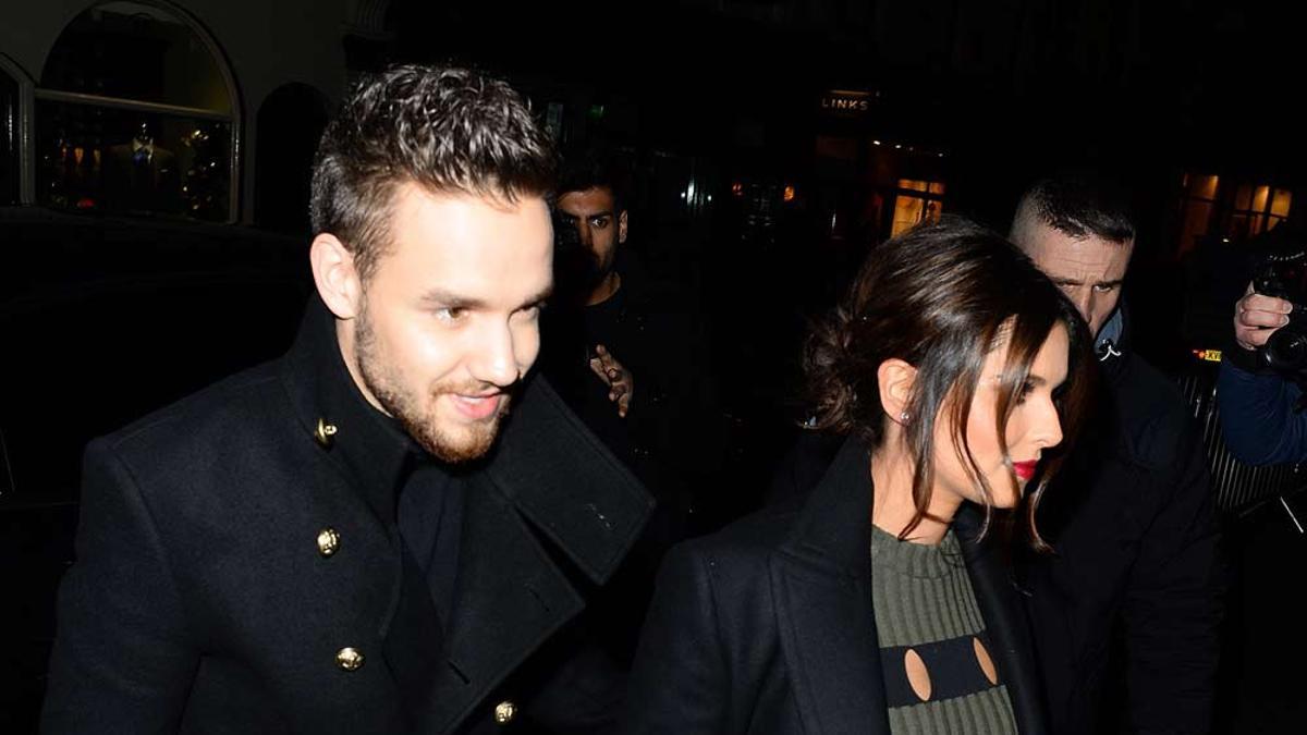 Liam Payne y Cheryl Cole saliendo de un concierto