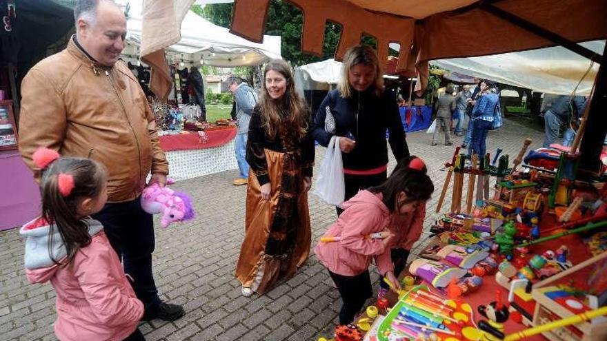 La lluvia fue una invitada inesperada al evento. // I. Abella