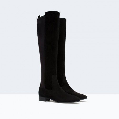 Bota elástica y de piel de Zara. Precio: 89,95 €