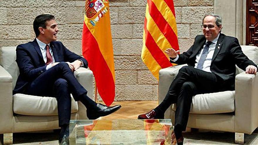 Pedro Sánchez i Quim Torra, durant la reunió al Palau de la Generalitat.