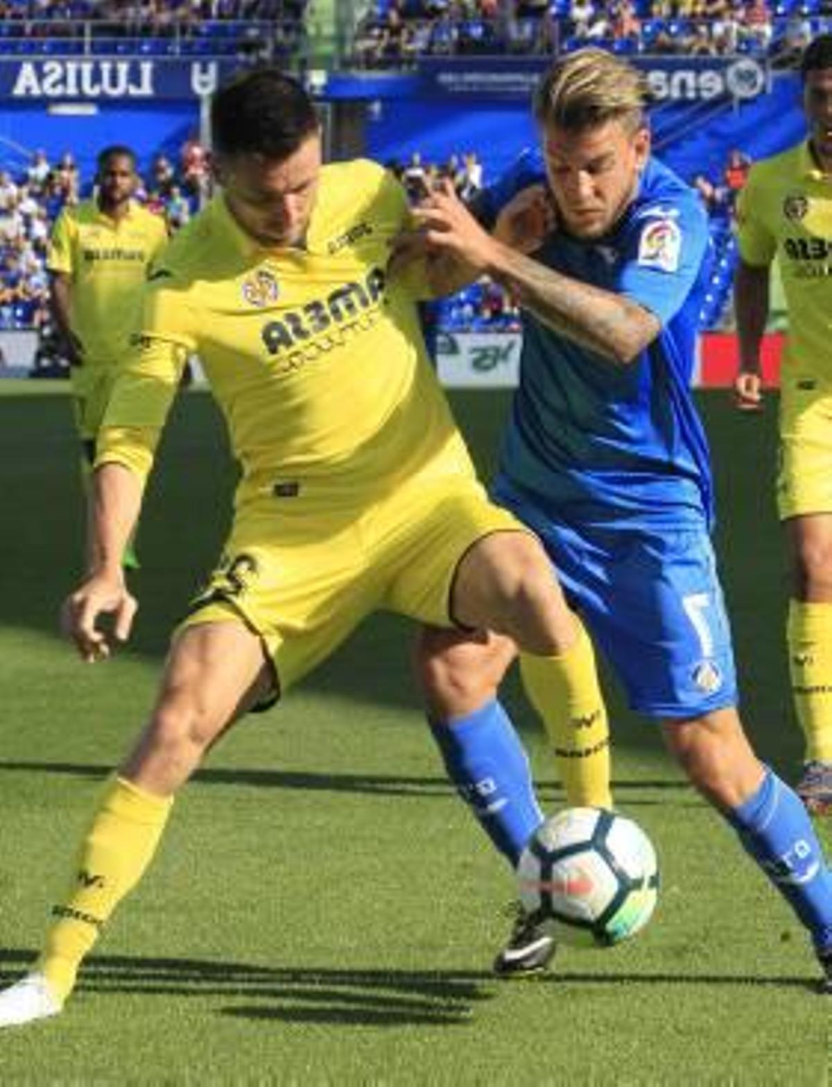 Álvaro Jiménez y Rukavina, durante el partido.