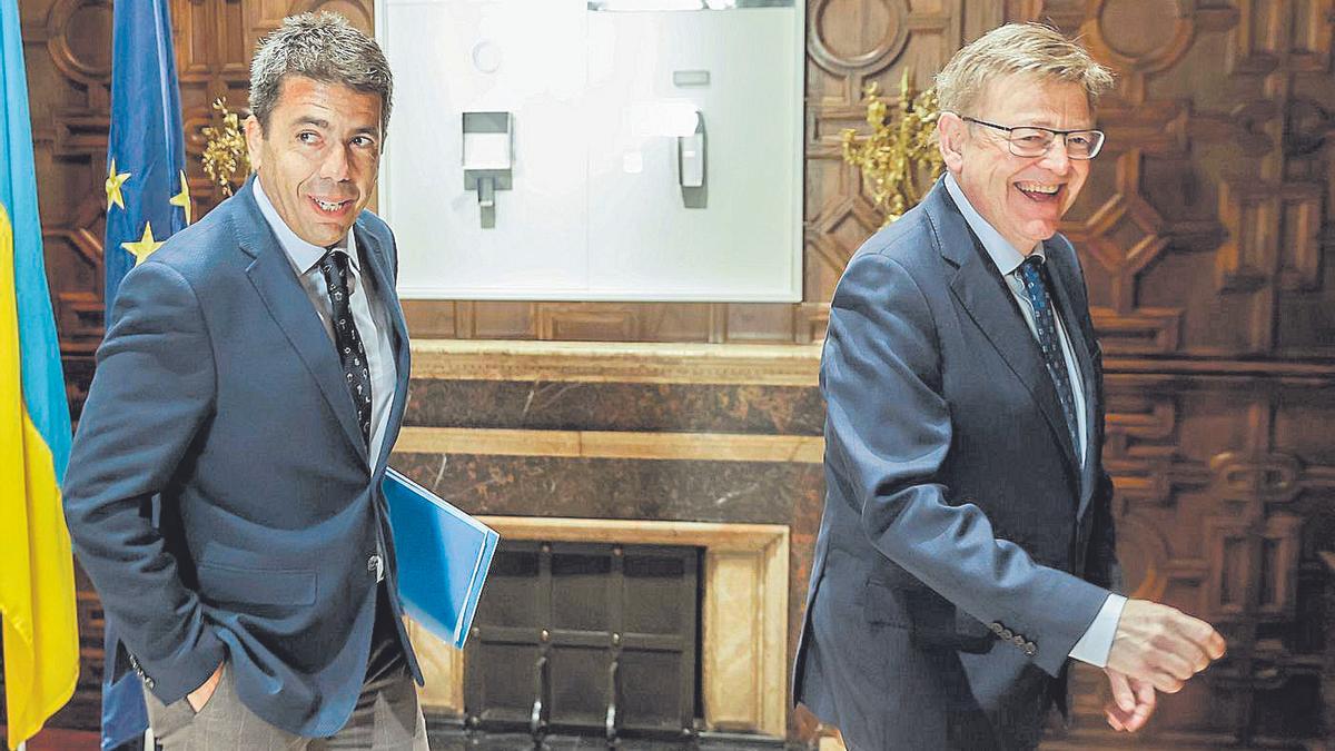 El presidente del PPCV, Carlos Mazón, y el líder de PSPV y Consell, Ximo Puig, antes de reunirse en mayo pasado.