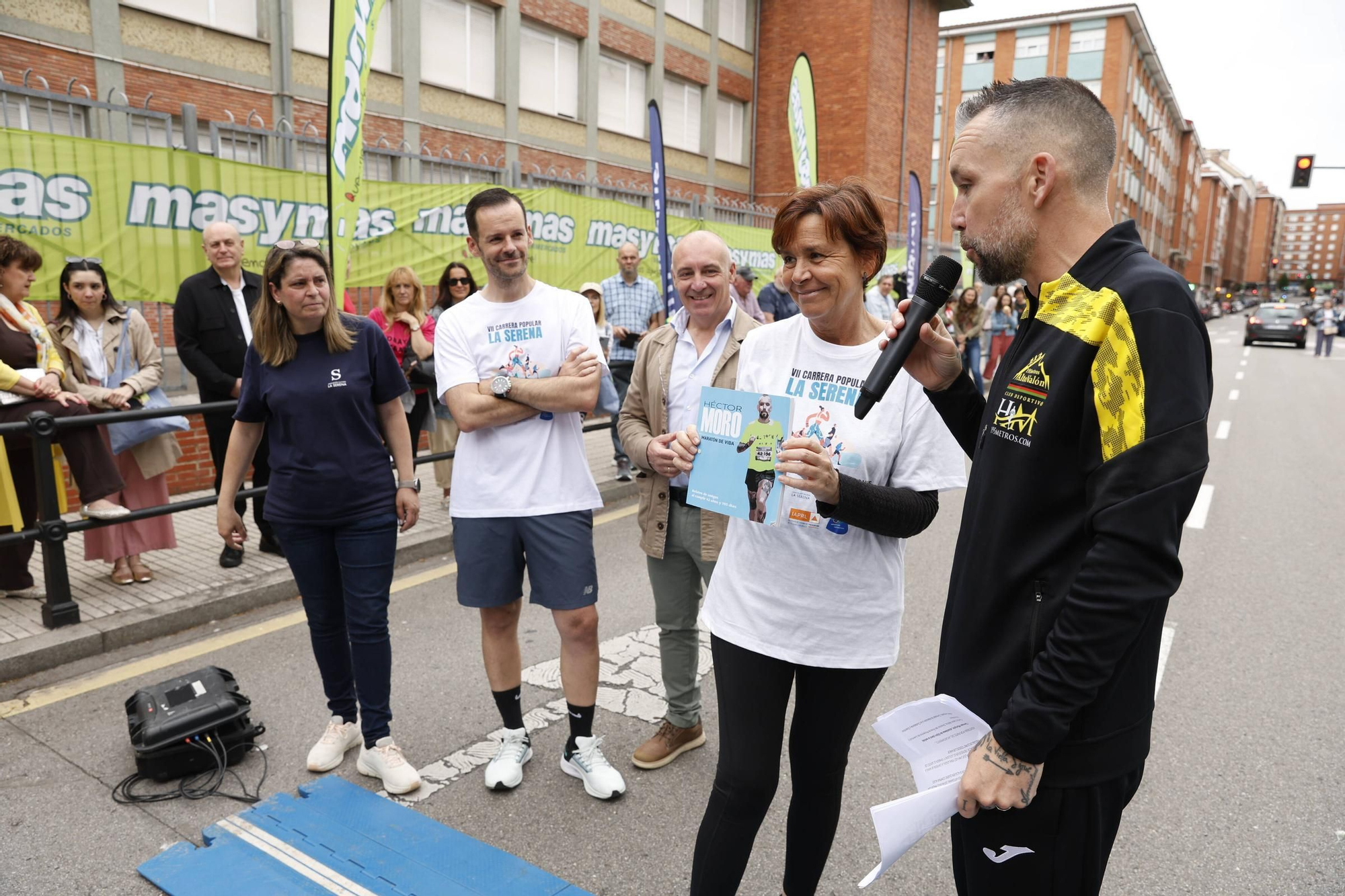 La carrera popular solidaria en El Llano, en Gijón, en imágenes
