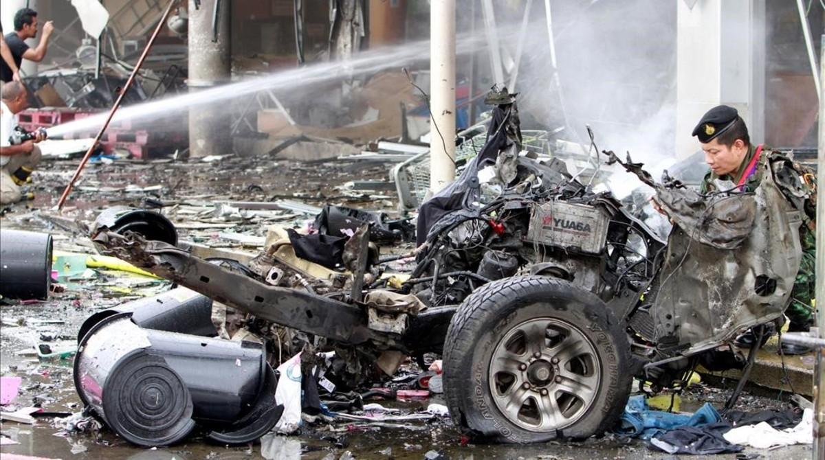 jgblanco38354384 remains of destroyed car are seen at a blast site outside a 170509124802