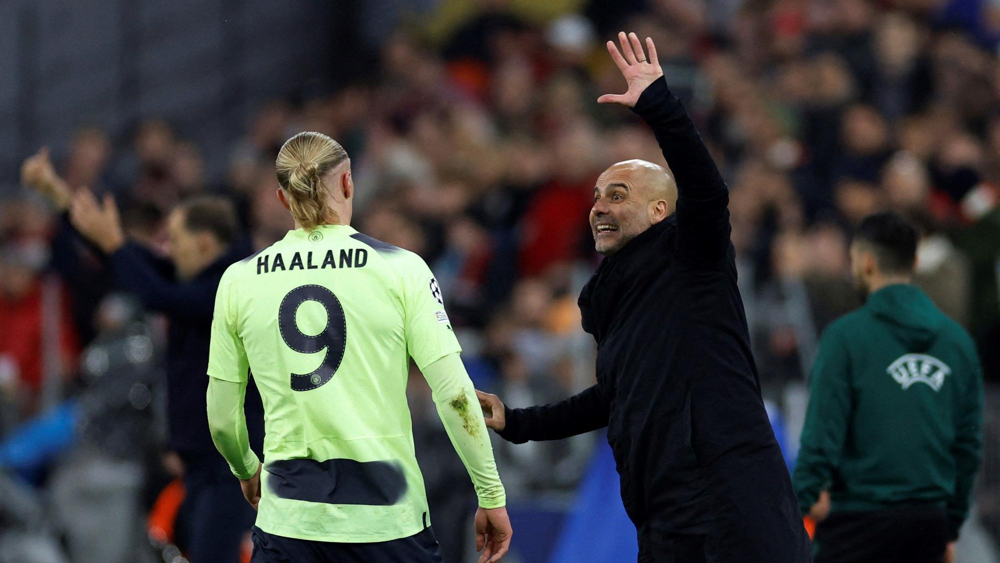 Haaland y Guardiola durante el Bayern-Manchester City en Múnich.