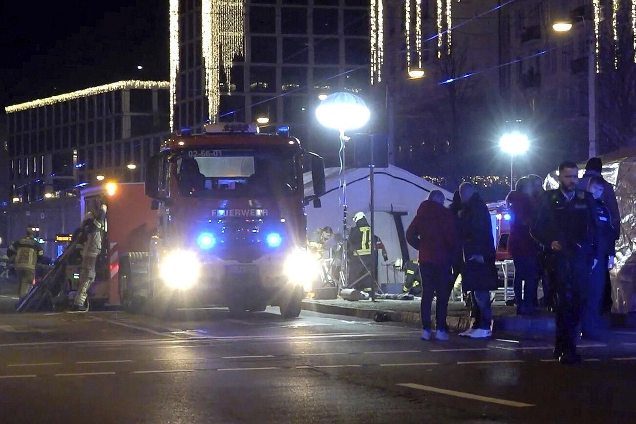 In this screen grab image from video, emergency services attend an incident at the Christmas market in Magdeburg, Germany, Friday Dec. 20, 2024. (Thomas Schulz/dpa via AP). GERMANY OUT; MANDATORY CREDIT - BEST QUALITY AVAILABLE
