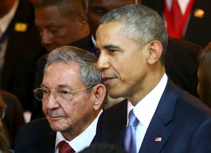 Cuba's President Raul Castro stands with his U.S. counterpart Barack Obama before the inauguration of the VII Summit of the Americas in Panama City