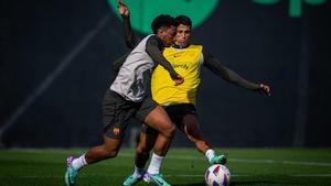 Cancelo y Balde, en el entrenamiento del viernes.