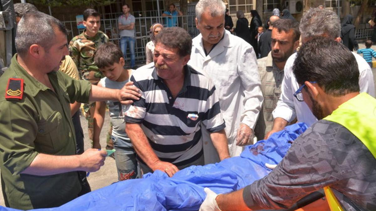 Syrian regime claims four dead as opposition forces fire rockets at neighborhood
