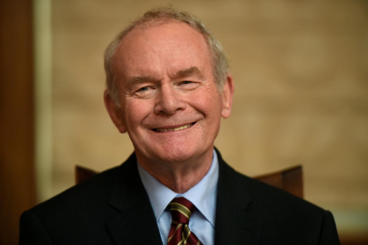 FILE PHOTO: Sinn Fein’s Martin McGuinness smiles during a news conference announcing Michelle O’Neill as his replacement for the upcoming elections, in Belfast, Northern Ireland January 23, 2017.  REUTERS/Clodagh Kilcoyne/File Photo     TPX IMAGES OF THE DAY