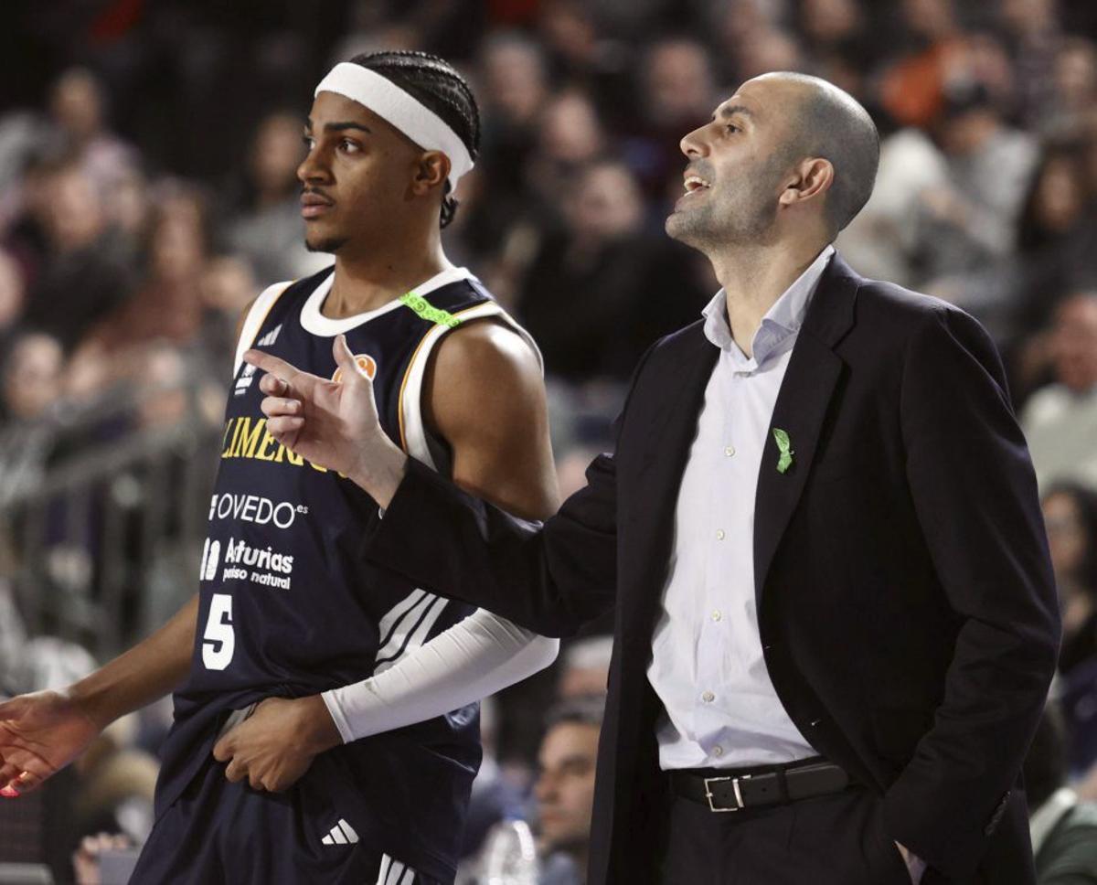 Greg Parham, a la izquierda, y Javi Rodríguez, ayer en el Palacio.  |