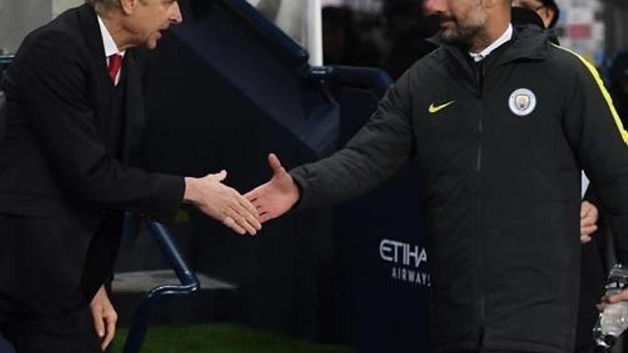 Wenger i Guardiola se saluden