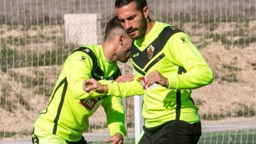Xavi Torres, junto a Borja, en un entrenamiento.