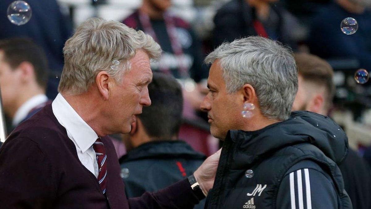Jose Mourinho junto a David Moyes en un partido frente al West Ham