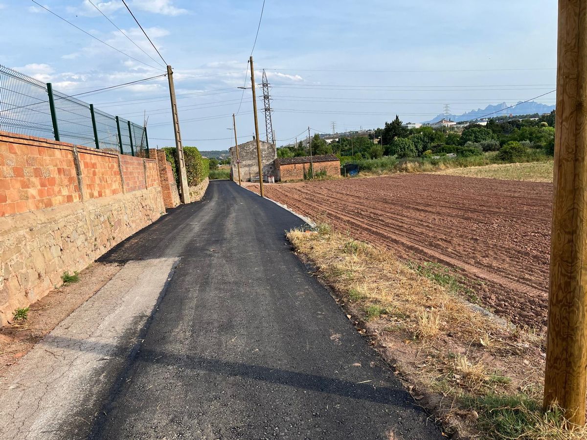 El camí reparat i asfaltat