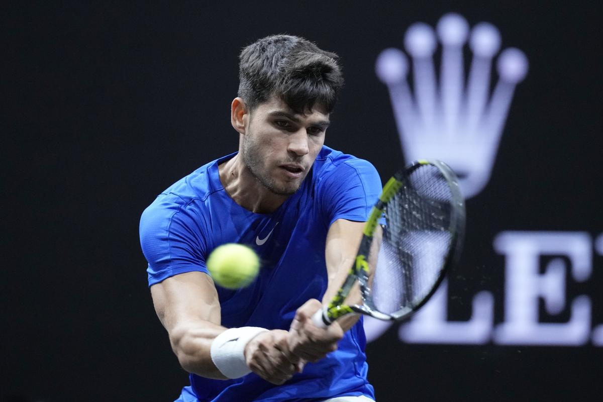 Team Europe's Carlos Alcaraz returns to Team World's Taylor Fritz on the third day of the Laver Cup tennis tournament, at the Uber arena in Berlin, Germany, Sunday, Sept. 22, 2024. (AP Photo/Ebrahim Noroozi)