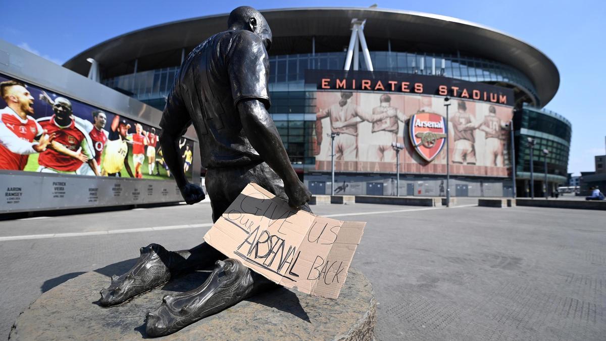 A poster against the Super League in front of the Arsenal stadium A poster against the Super League in front of the Arsenal stadium