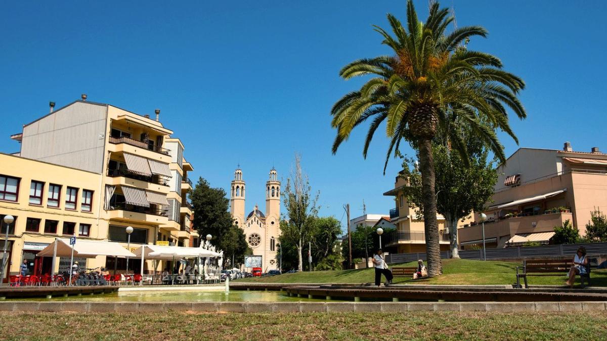 Paisaje de la ciudad con vistas a la iglesia y a la fuente