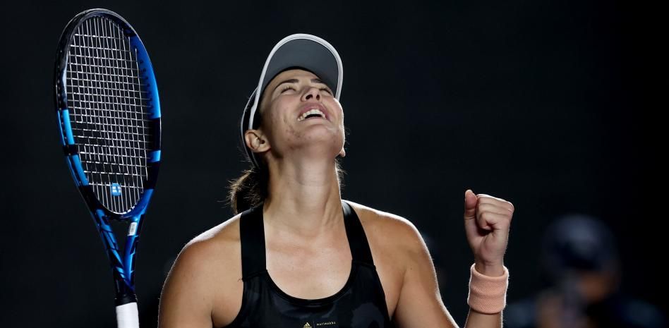 Muguruza celebra un golpe ganador