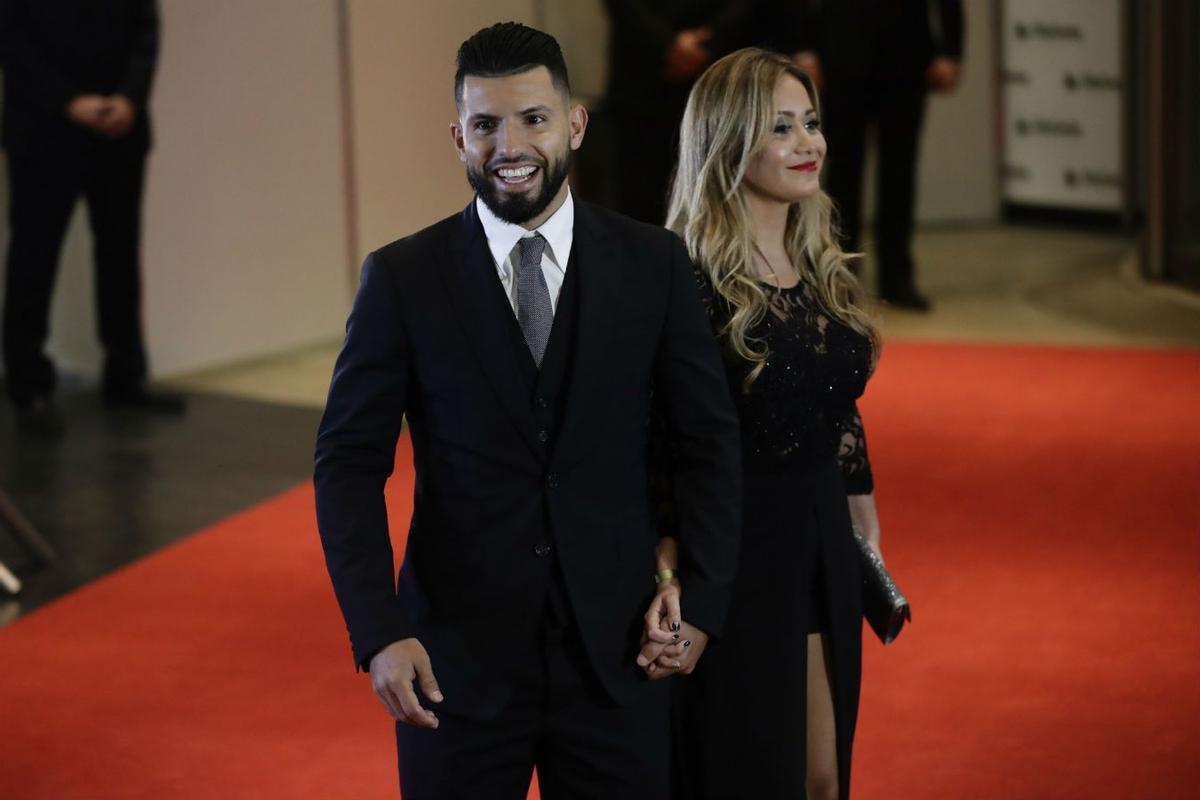 Sergio Aguero y Karina Tejeda en la boda de Messi y Antonella