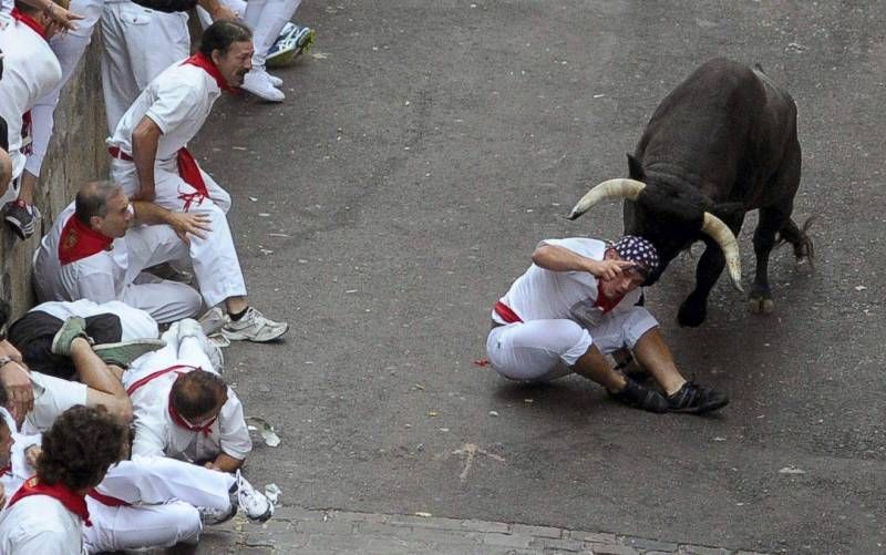 Fotogalería del quinto encierro de San Fermín