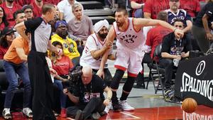 Jun 2  2019  Toronto  Ontario  CAN  Toronto Raptors center Marc Gasol  33  collides with Raptors fan Nav Bhatia during the second quarter in game two of the 2019 NBA Finals at Scotiabank Arena  Mandatory Credit  Kyle Terada-USA TODAY Sports