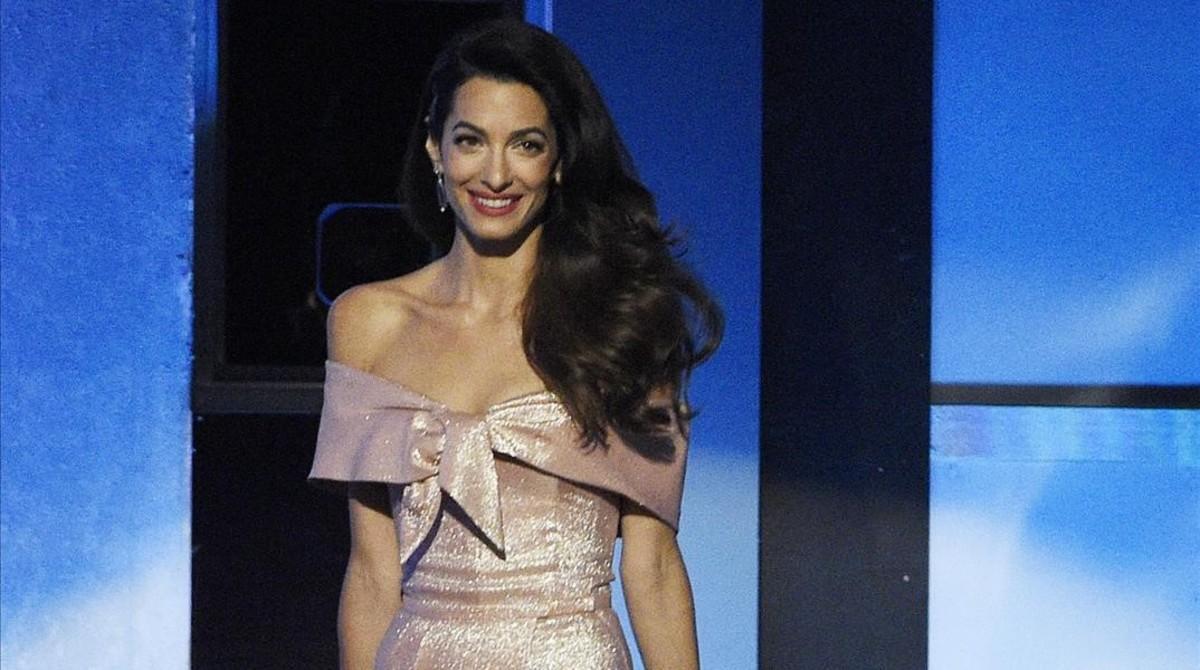 zentauroepp43889413 file in this june 7 2018 file photo amal clooney takes t180625132854 zentauroepp43889413 file in this june 7 2018 file photo amal clooney takes t180625132854